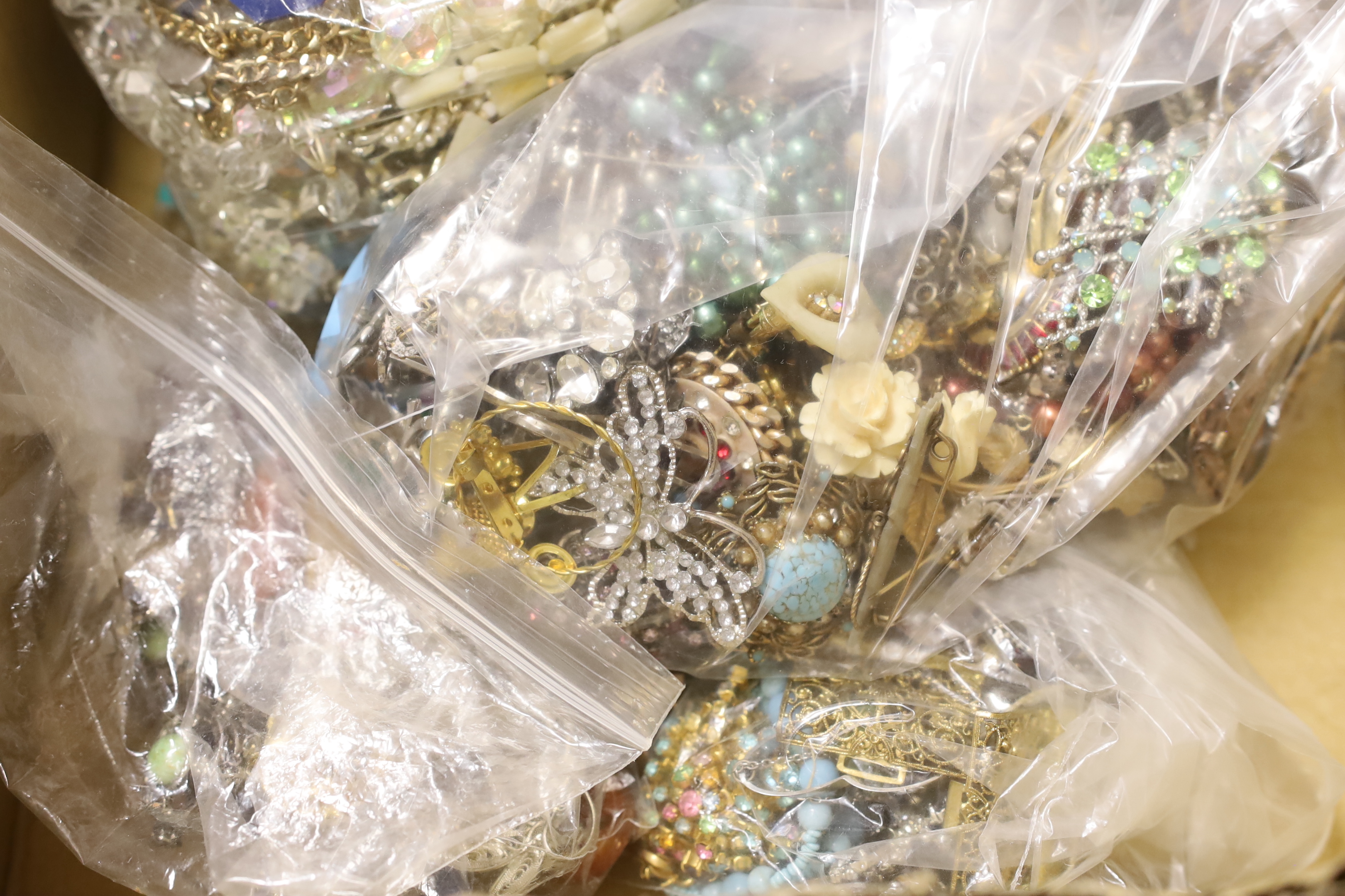 Ten bags of assorted costume jewellery, including necklaces, bracelets, brooches, etc.